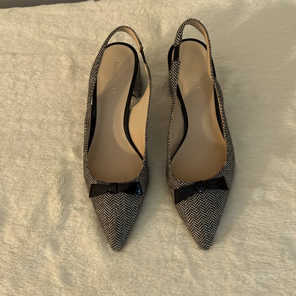 Nine West sling back. Size 7. Black and white. 2” block heel. Good condition